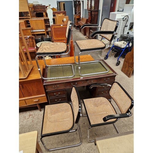 1090 - A set of four Marcel Breuer chrome & cane seat chairs (2 carvers), made in Italy circa 1980s.