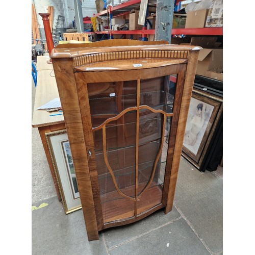 1130 - A 1930s Art Deco walnut display cabinet.