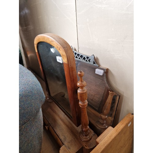 1109 - A mahogany toilet mirror and an Art Deco style mirror.