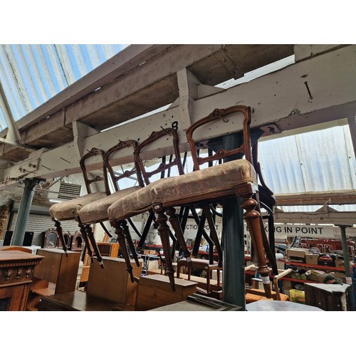 1110 - A set of four late Victorian walnut chairs with fluted legs