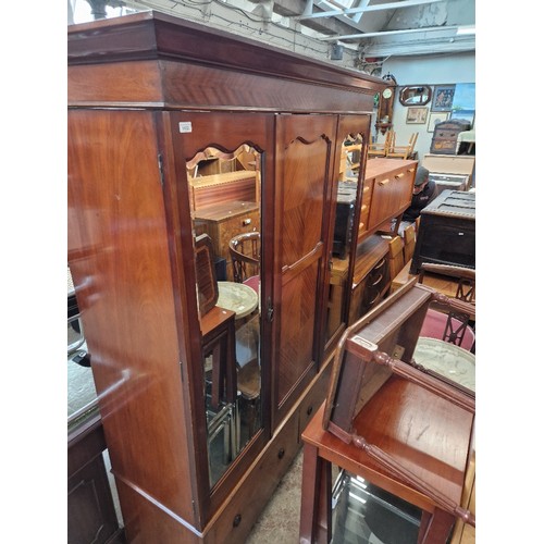 1132 - An Edwardian mahogany wardrobe