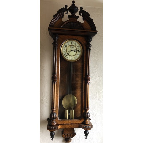 1126 - A double weight walnut Vienna wall clock.