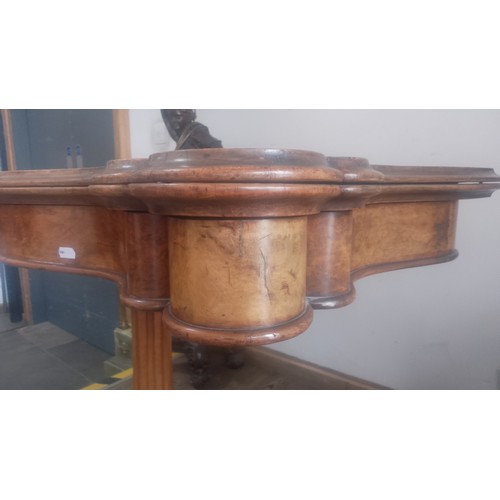 959 - A Victorian walnut pedestal card table, serpentine top with brown baize and tooled leather interior,... 