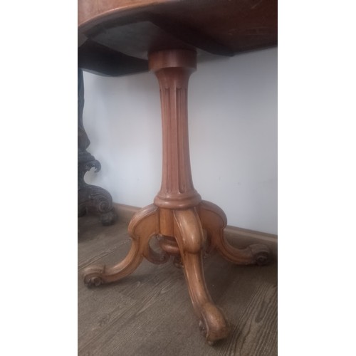 959 - A Victorian walnut pedestal card table, serpentine top with brown baize and tooled leather interior,... 