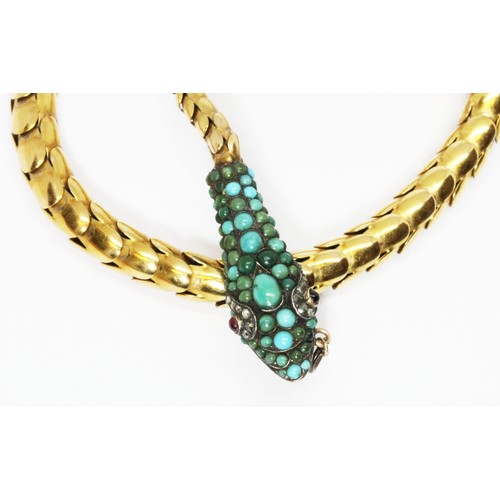 1 - A Victorian serpentine necklace, circa 1860, the snake head set with turquoise cabochons, one ruby a... 