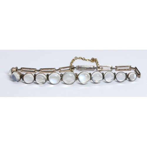 61 - An antique yellow metal moonstone cabochon bracelet, unmarked, length 15cm, gross weight 4.9g.