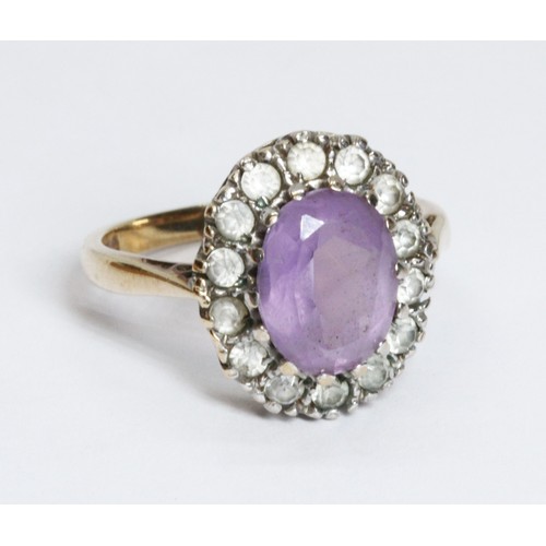 66 - A hallmarked 9ct gold amethyst and colourless stone cluster ring, gross weight 3.2g, size J.