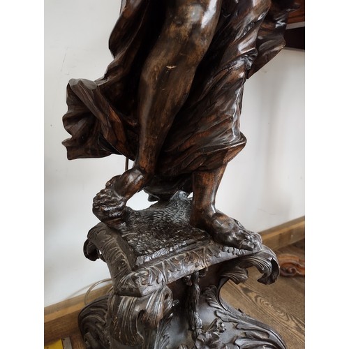 958 - A Continental carved wood floor standing lamp modelled as a classical figure stood on base, height 1... 