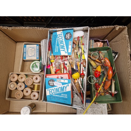 462 - A collection of vintage fishing tackle in 2 boxes  including spinners, lures, porcupine quill floats... 