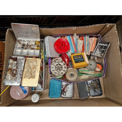 462 - A collection of vintage fishing tackle in 2 boxes  including spinners, lures, porcupine quill floats... 