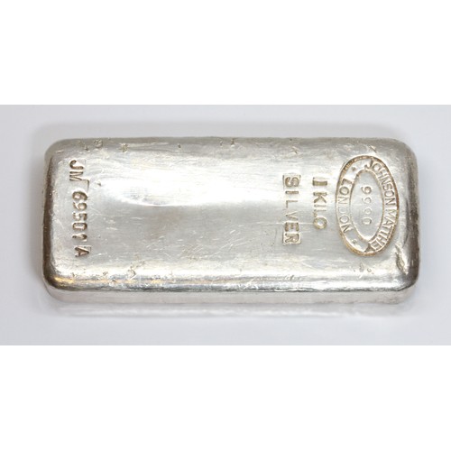 A silver bullion bar, Johnson Matthey London 9990 1 Kilo Silver, serial ...