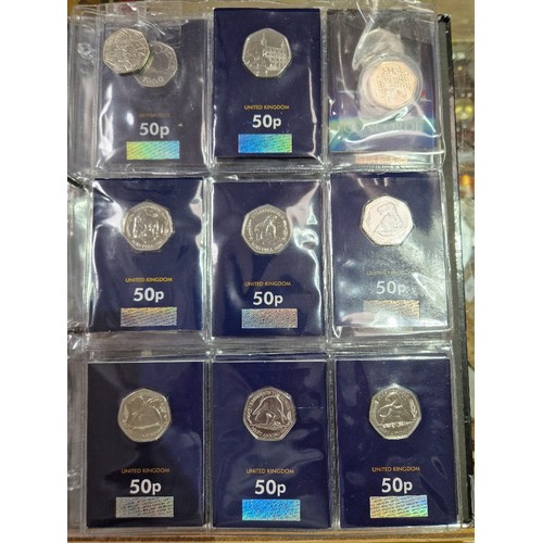 420 - A file of assorted collectable coins in change checker cards comprising of 43 x 50ps (2 x Gruffalo, ... 