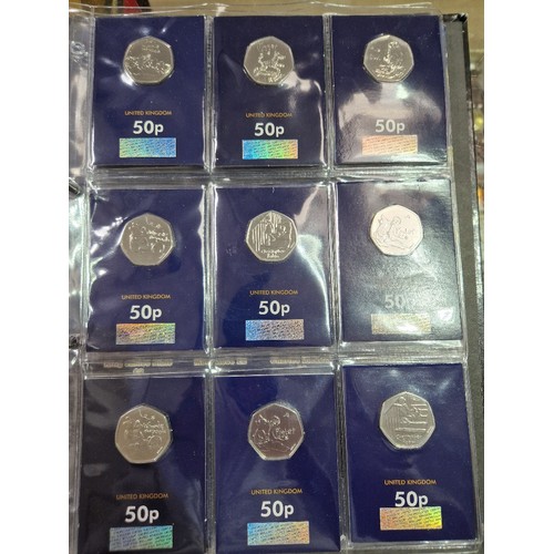 420 - A file of assorted collectable coins in change checker cards comprising of 43 x 50ps (2 x Gruffalo, ... 