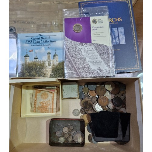 437 - A box of assorted GB & world coins & sets to include some silver etc.