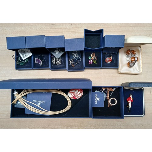 491 - A collection of Swarovski jewellery comprising six rings and two pendant necklaces, together with a ... 