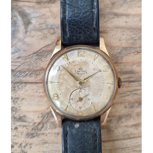 470 - A 9ct gold Smiths De Luxe wristwatch, case diameter 33mm, leather strap, with Boodle & Dunthorne box... 