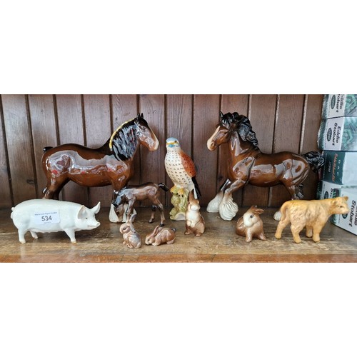 10 Beswick animals/birds including Kestrel (2316), Highland Calf (1827D ...