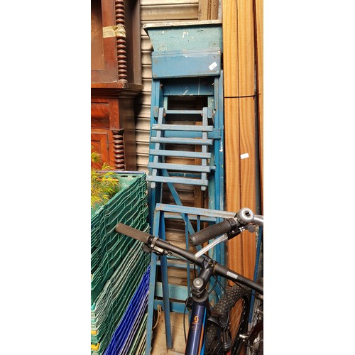 24 - 5 pairs of wooden step ladders and 3 electric heaters