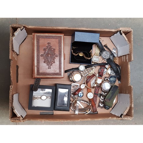 55 - A box of assorted watches.