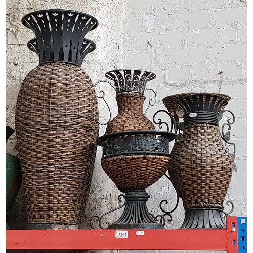 124 - Six wicker and wire work vases.