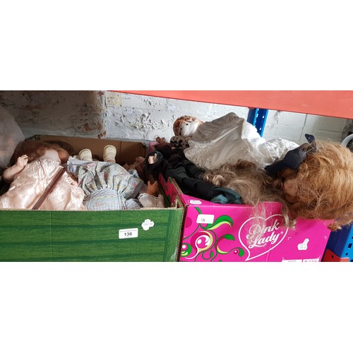 136 - Two boxes of dolls and soft toys.