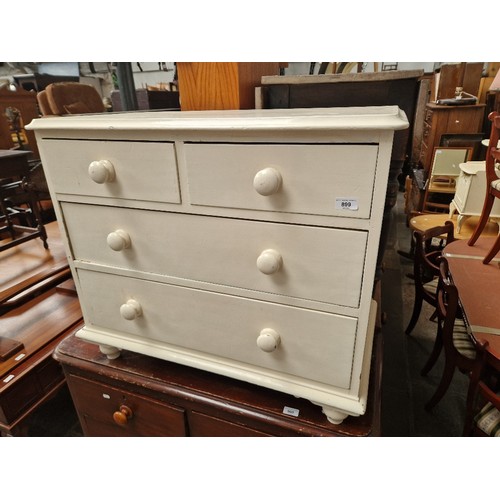 899 - A Victorian white painted chest of drawers.