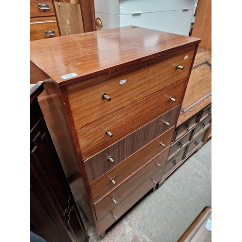 915 - A mid 20th century Lebus teak chest of drawers.