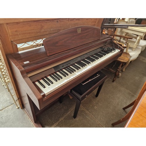 927 - A Yamaha Clavinova CPL-950 electric piano with stool.