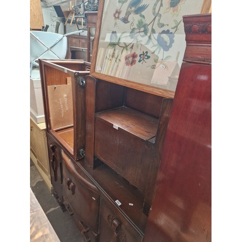 910 - Assorted furniture comprising an oak sideboard, a hall stand, a trolley and an embroidered fire scre... 