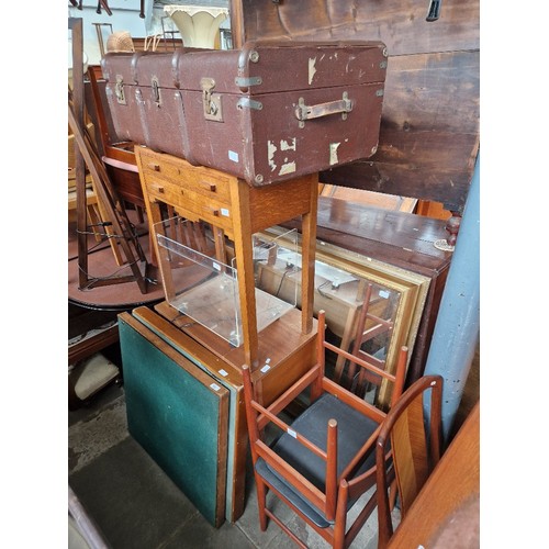 928 - A mixed lot of furniture comprising two card tables, a plastic trolley box, a trunk, an oak canteen ... 