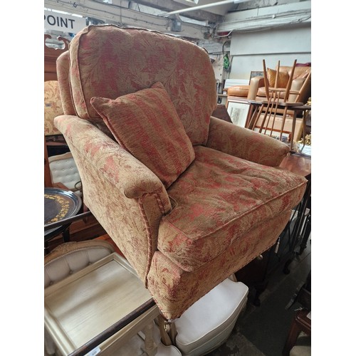 931 - A Duresta upholstered armchair.