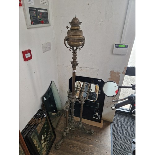 962 - A Victorian brass adjustable oil lamp.