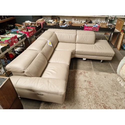 955 - An Italian grey leather corner settee with electric reclining section.