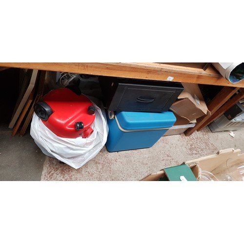 421 - A large quantity of miscellaneous items including Henry vacuum cleaner, lamp, books, pictures, coolb... 