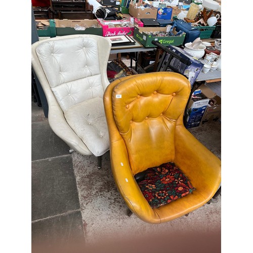 973 - Two leather swivel chairs