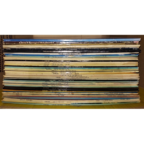 123 - A box of vinyl LP records including Elton John, Status Quo, The Beach Boys and various Top of the Po... 