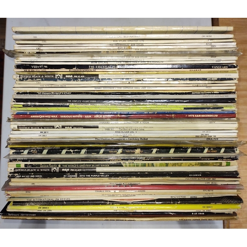 124 - A box of vinyl LP records including ten Bob Dylan albums, Pink Floyd 'The Wall', Pete Seager, etc.