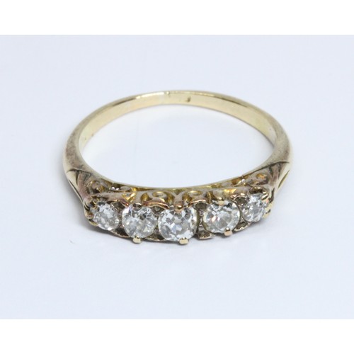 11 - An antique five stone diamond ring, the Old European cut diamonds weighing approximately 0.75cts in ... 