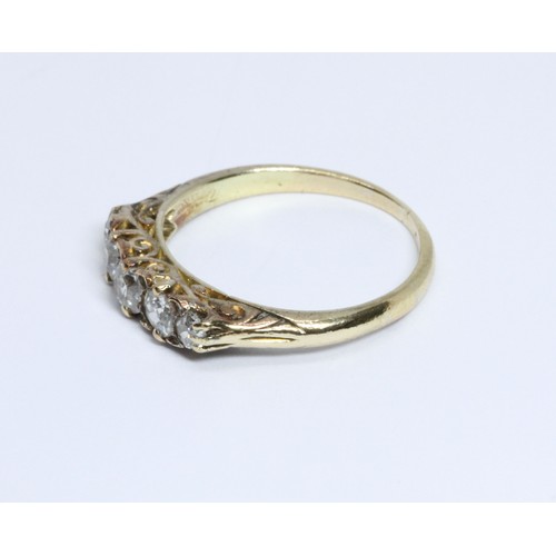 11 - An antique five stone diamond ring, the Old European cut diamonds weighing approximately 0.75cts in ... 