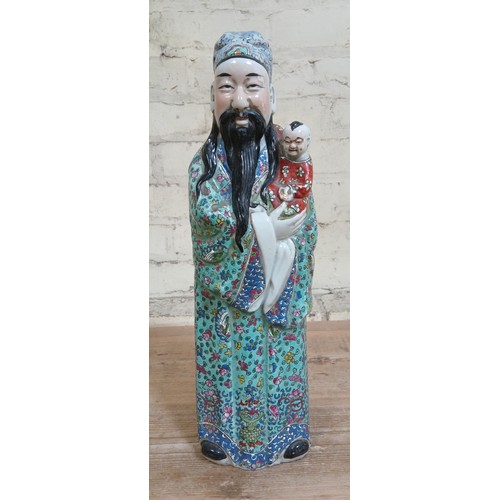 431 - A Chinese porcelain figure, height 46cm.