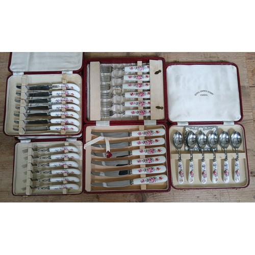 423 - 4 cased sets of Royal Crown Derby cutlery.