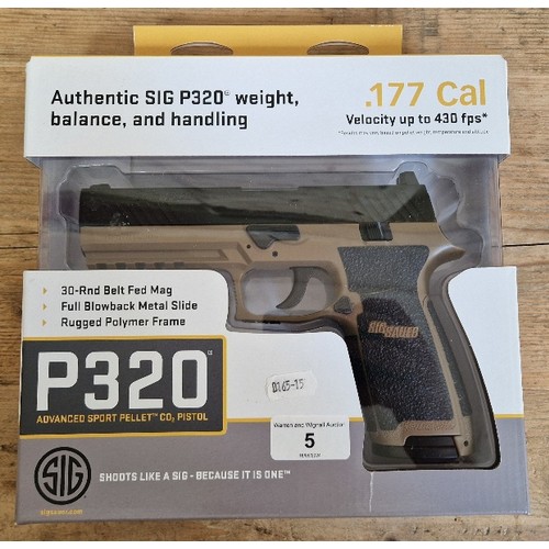 5 - A Sig Sauer P320 .177 calibre Co2 air pistol, serial no.17E24343, 20cm long, in original box with ma... 