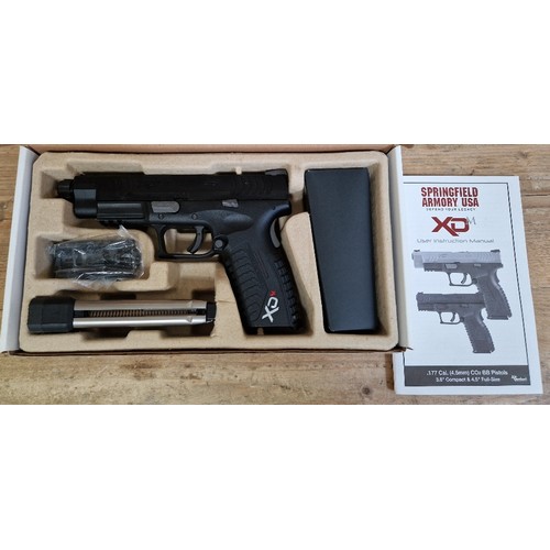 9 - A Springfield Armory XDM 4.5mm calibre Co2 BB air gun, serial no.MG520899, 21cm long, in original bo... 