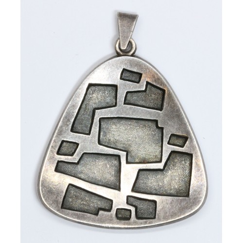 48 - A Norwegian Sterling silver Modernist pendant designed by Willy Winneass for David Andersen, length ... 