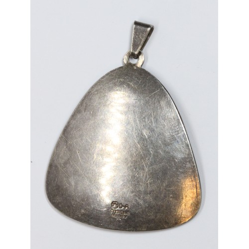 48 - A Norwegian Sterling silver Modernist pendant designed by Willy Winneass for David Andersen, length ... 