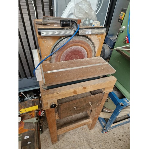 8 - A table mounted disc sander