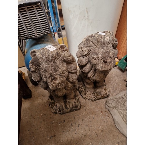 19 - A pair of concrete lions