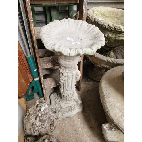 18 - An ornamental concrete plinth with bird bath