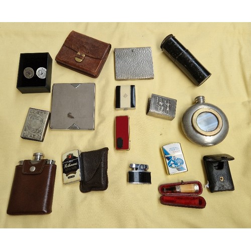 31 - A box including lighters, hip flasks and other collectables.