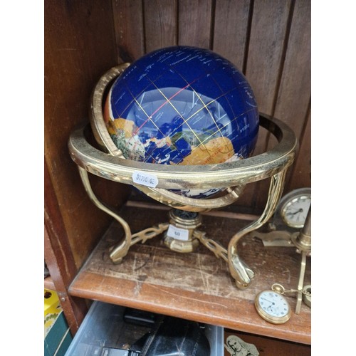 60 - A multi-gem set terrestrial globe.